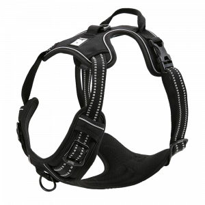 Side view of black no-pull dog harness with reflective stitching, breathable padding, adjustable straps, and handle on top.